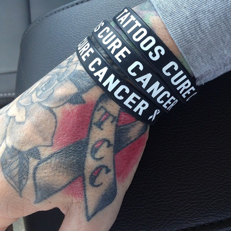 Tattoo artists ink in pink for cancer research funds | The Blade